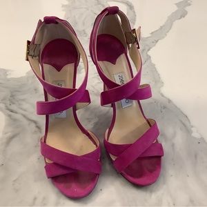 Pink Jimmy Choo heels.